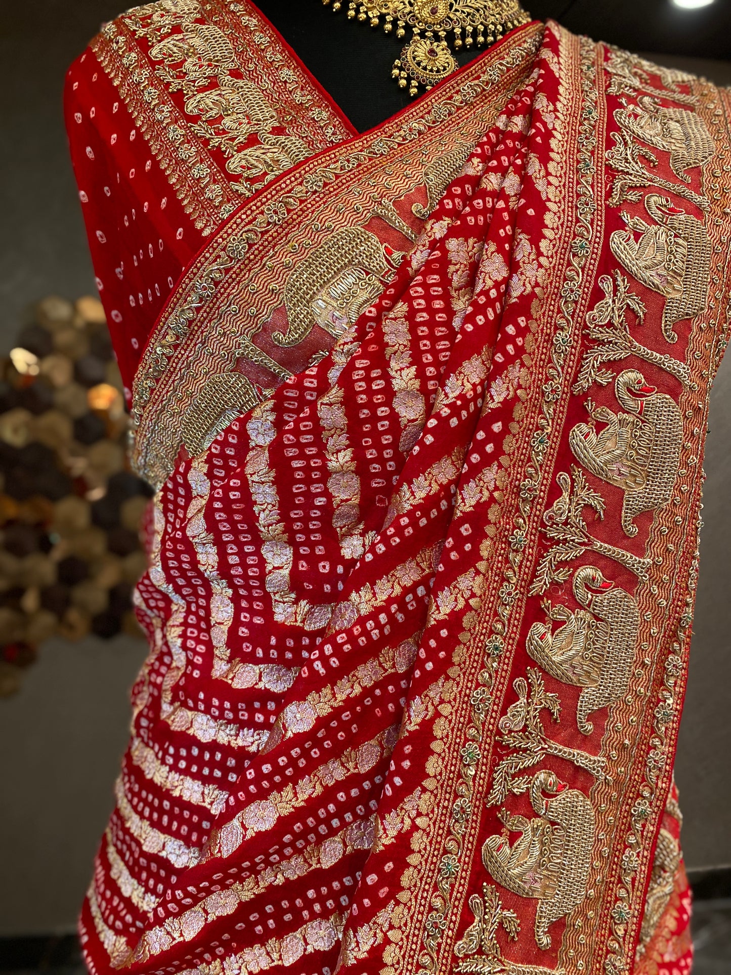 AN ELEGANT RED BANDHANI EMBROIDERED SAREE