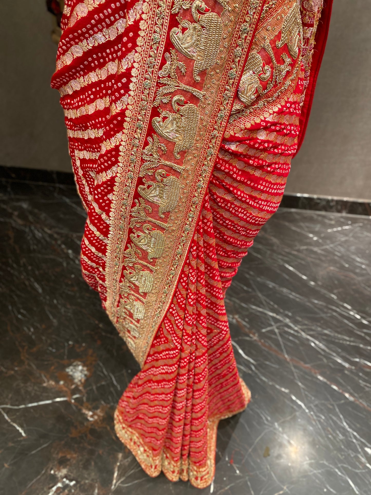 AN ELEGANT RED BANDHANI EMBROIDERED SAREE