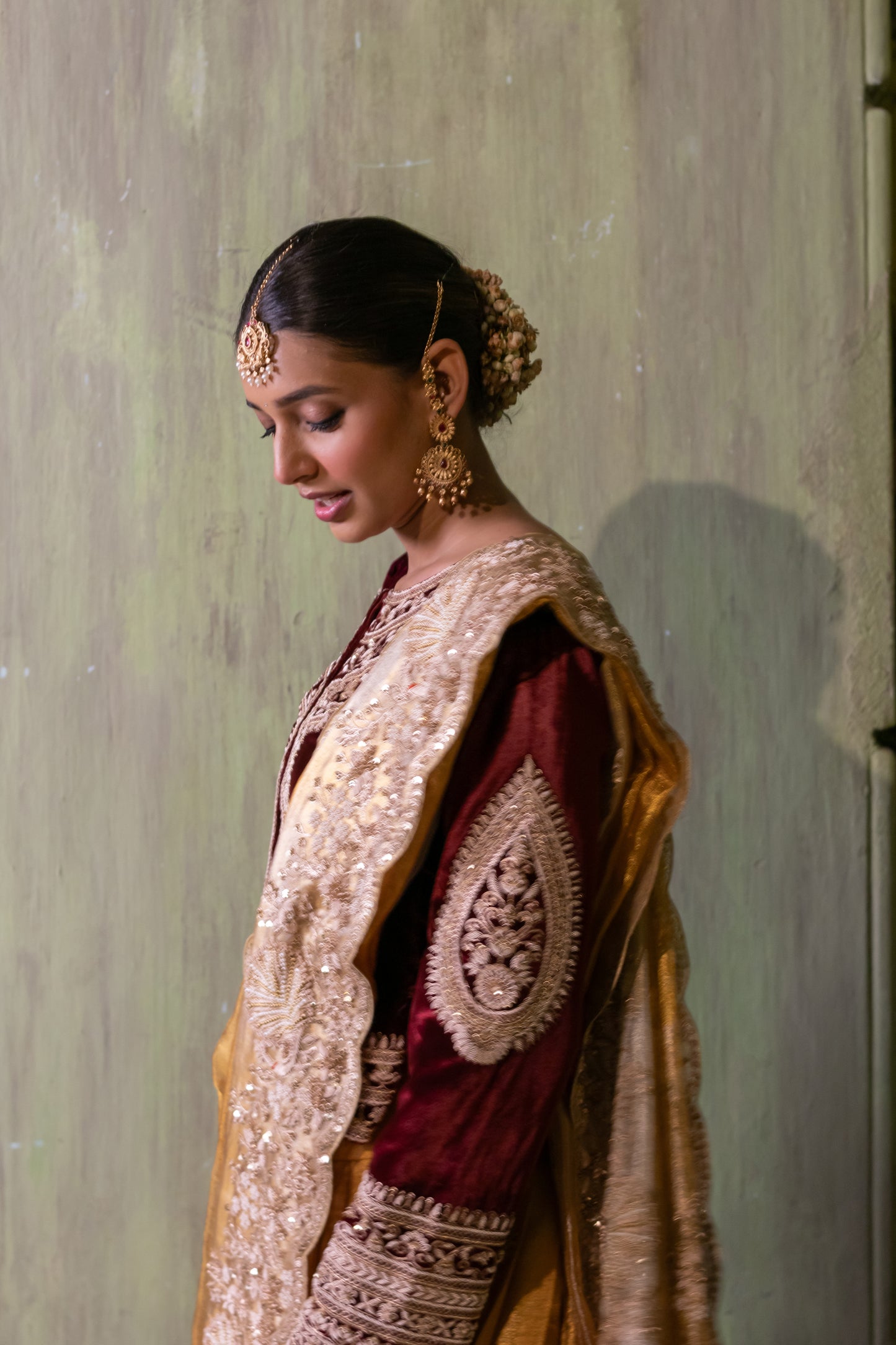 HANDWOVEN KANJIVARAM TISSUE LEHENGA WITH ZARDOZI EMBELISHMENT