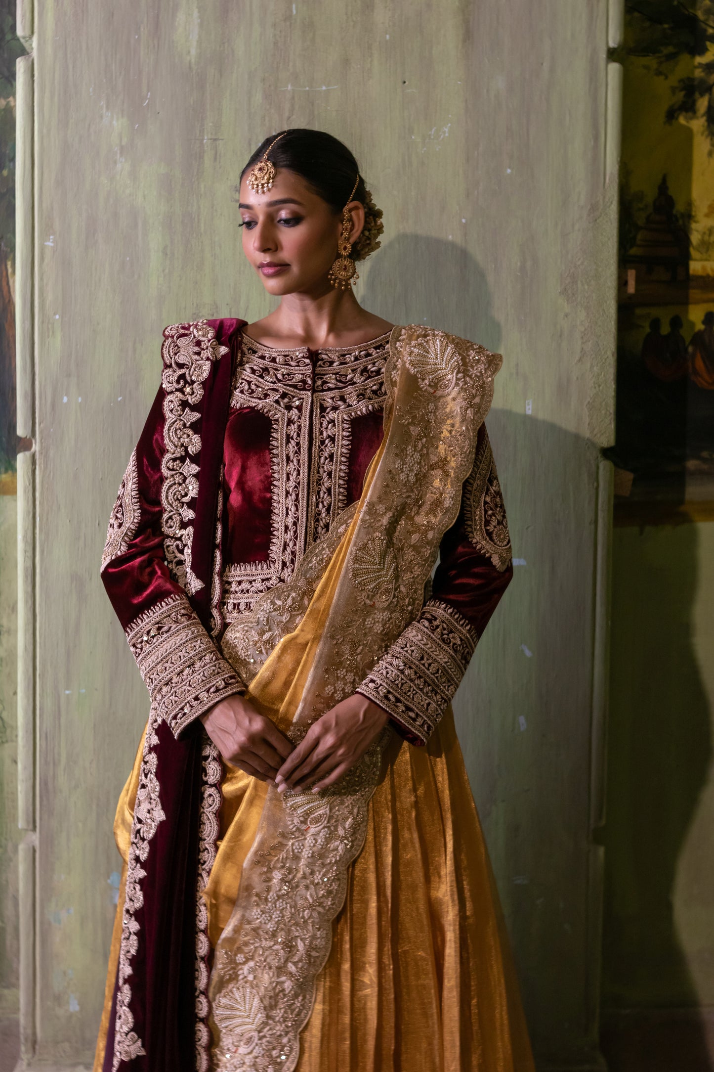 HANDWOVEN KANJIVARAM TISSUE LEHENGA WITH ZARDOZI EMBELISHMENT
