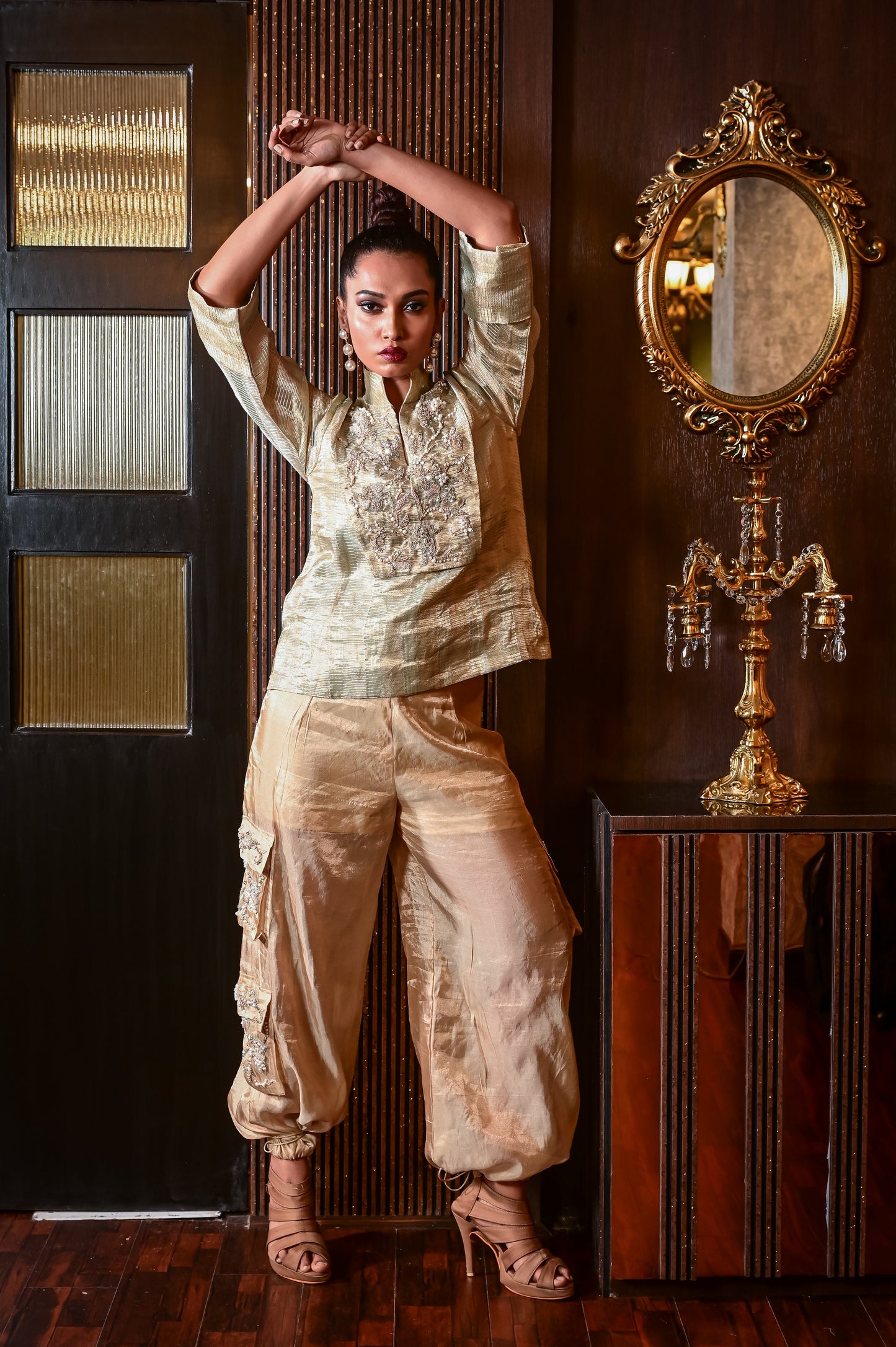 A BROCADE TOP PAIRED WITH TISSUE CARGO PANTS GS2050