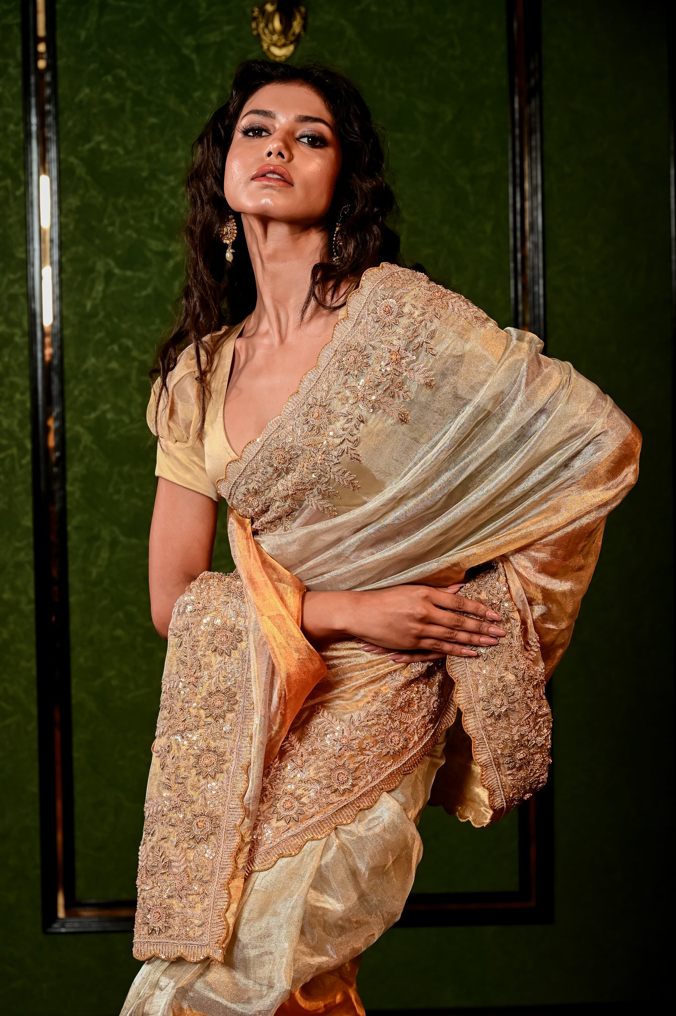 A GOLD-IVORY HALF AND HALF KANCHI TISSUE SAREE 8129