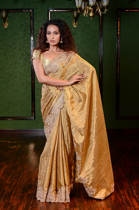 A PURE GOLD EMBROIDERED TISSUE SAREE 8095