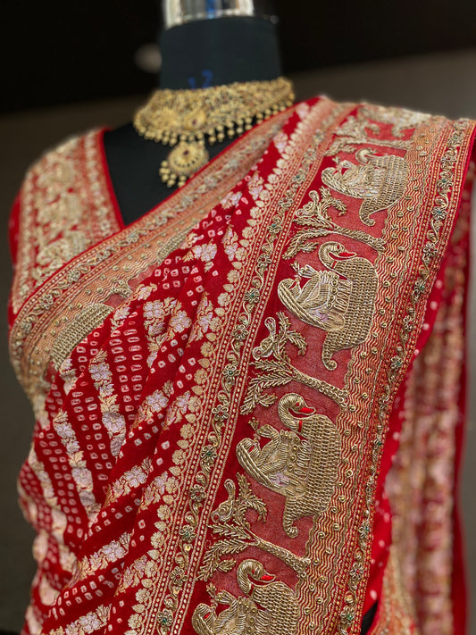 AN ELEGANT RED BANDHANI EMBROIDERED SAREE